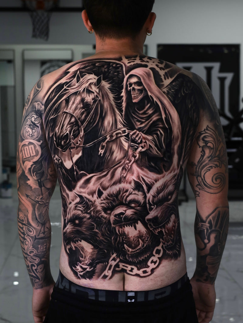 reaper tattoo with 3 headed dog